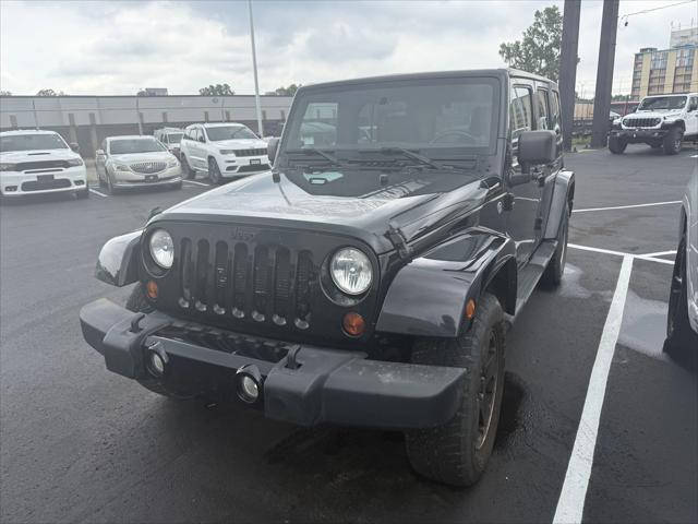 used 2012 Jeep Wrangler Unlimited car, priced at $14,900