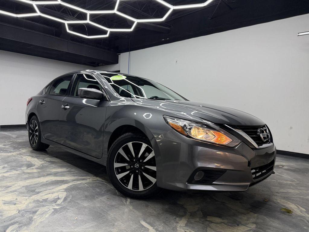 used 2018 Nissan Altima car, priced at $9,900