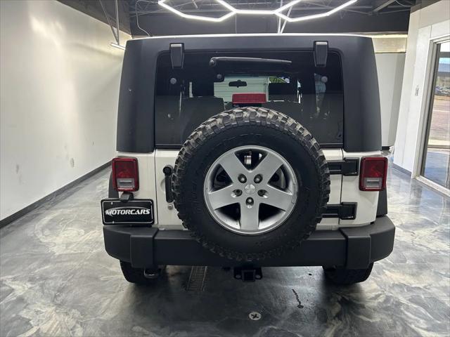 used 2010 Jeep Wrangler Unlimited car, priced at $15,995