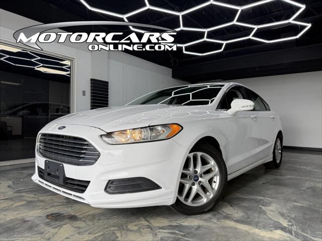 used 2015 Ford Fusion car, priced at $8,900
