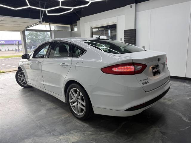 used 2015 Ford Fusion car, priced at $8,900