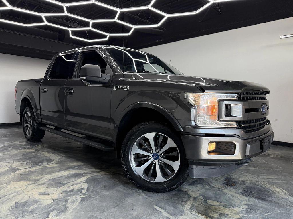 used 2018 Ford F-150 car, priced at $18,900