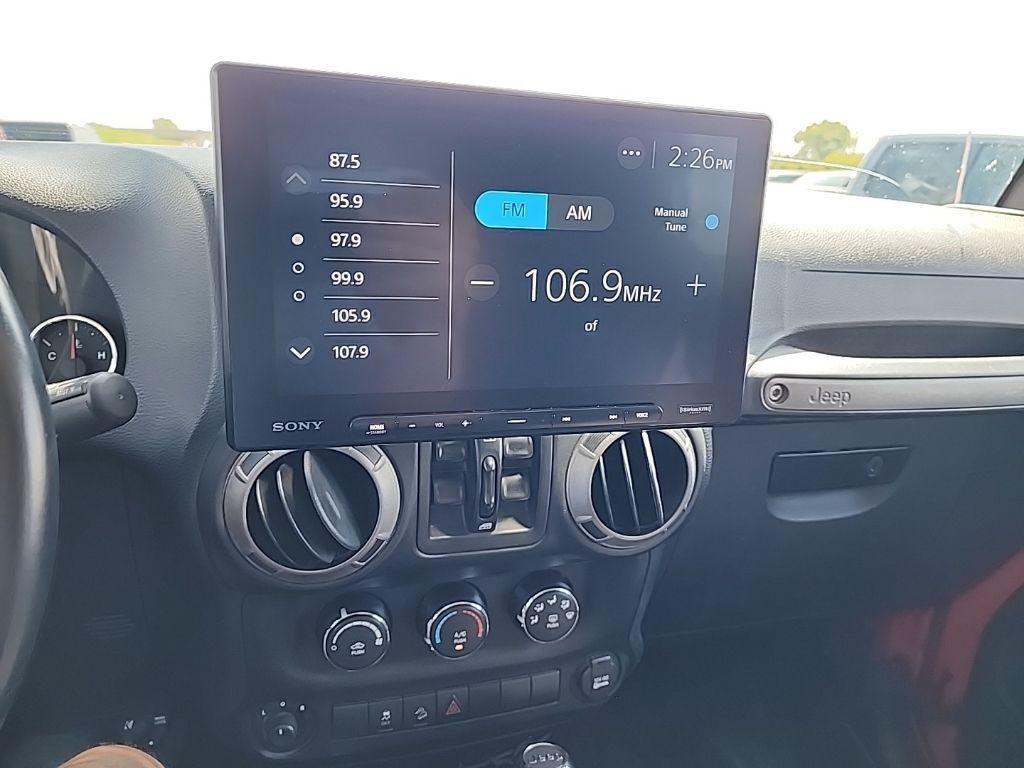 used 2015 Jeep Wrangler Unlimited car, priced at $18,518