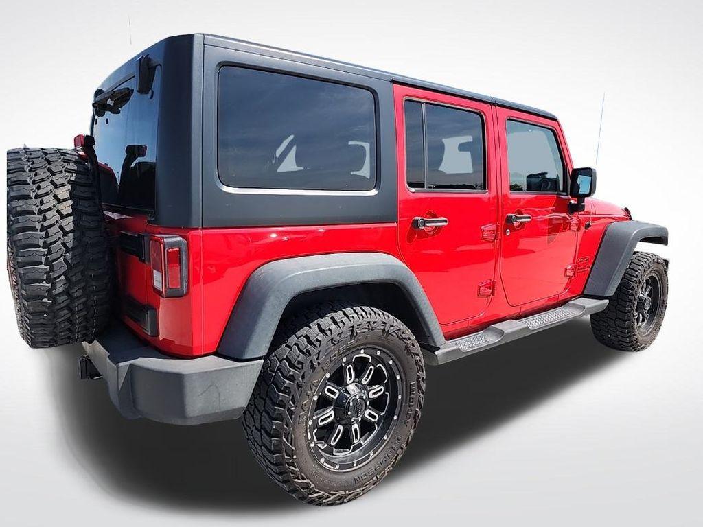 used 2015 Jeep Wrangler Unlimited car, priced at $18,518