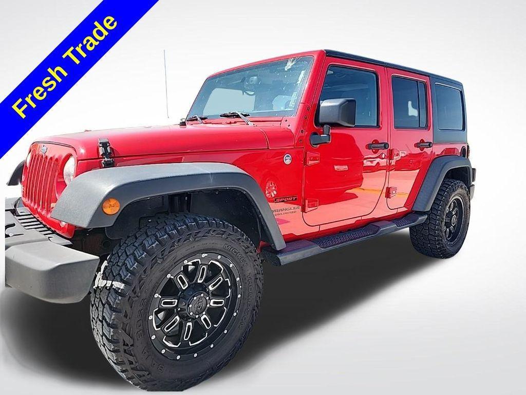 used 2015 Jeep Wrangler Unlimited car, priced at $18,518