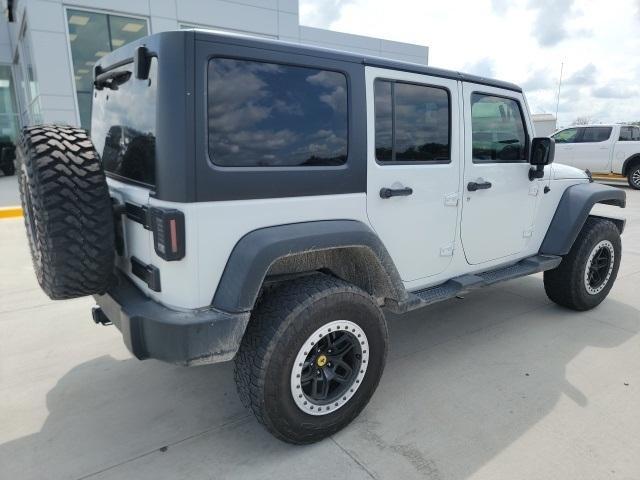 used 2018 Jeep Wrangler JK Unlimited car, priced at $17,526