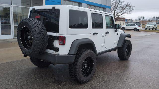 used 2017 Jeep Wrangler Unlimited car, priced at $27,637