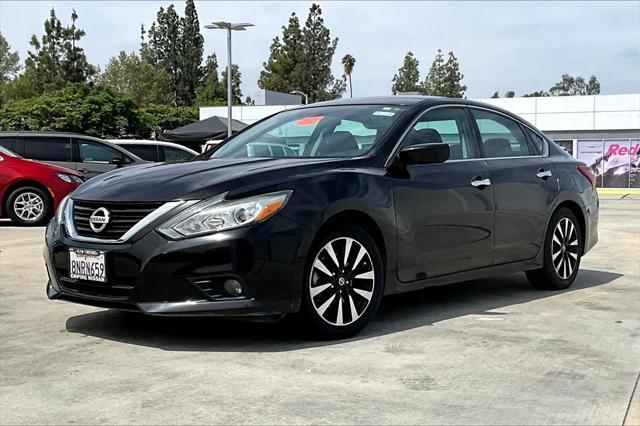 used 2018 Nissan Altima car, priced at $10,000
