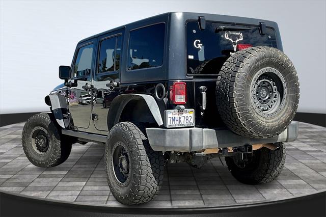 used 2015 Jeep Wrangler Unlimited car, priced at $18,000