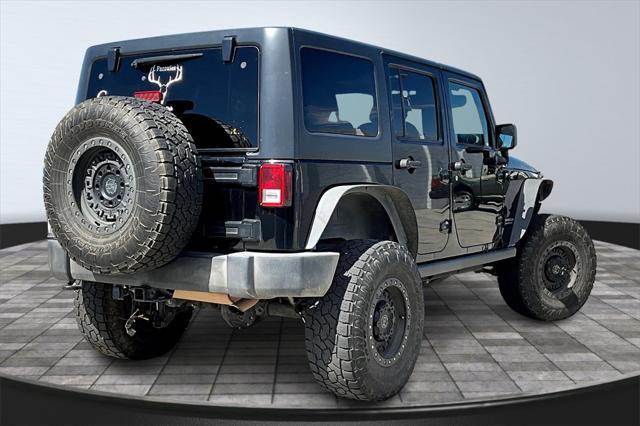 used 2015 Jeep Wrangler Unlimited car, priced at $18,000