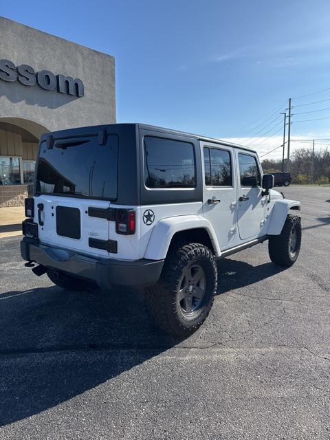 used 2015 Jeep Wrangler Unlimited car, priced at $18,714