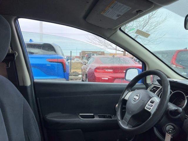 used 2009 Nissan Versa car, priced at $4,000