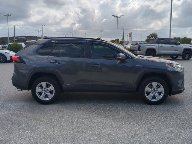 used 2021 Toyota RAV4 Hybrid car, priced at $28,581