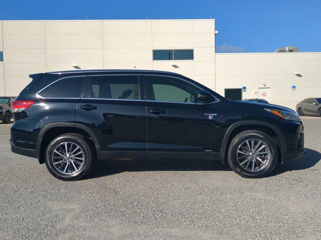 used 2019 Toyota Highlander Hybrid car, priced at $22,985