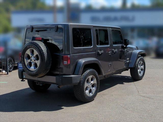 used 2016 Jeep Wrangler Unlimited car, priced at $22,990