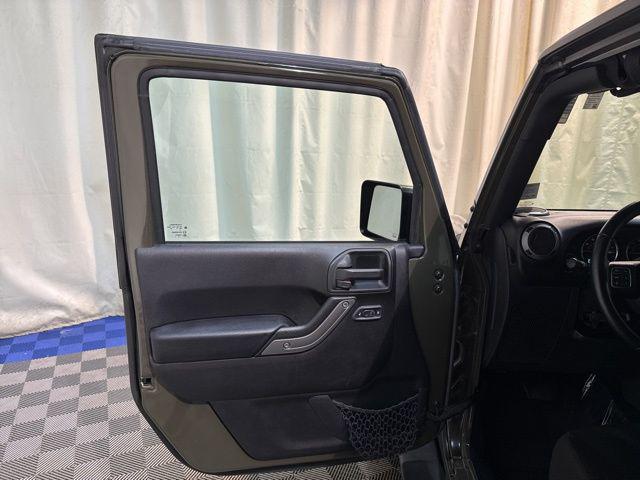used 2015 Jeep Wrangler car, priced at $13,396