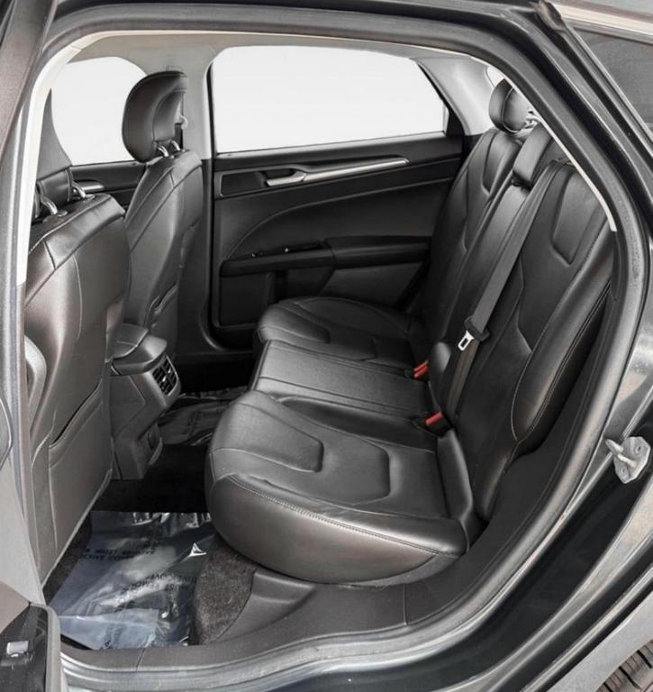 used 2015 Ford Fusion car, priced at $10,000