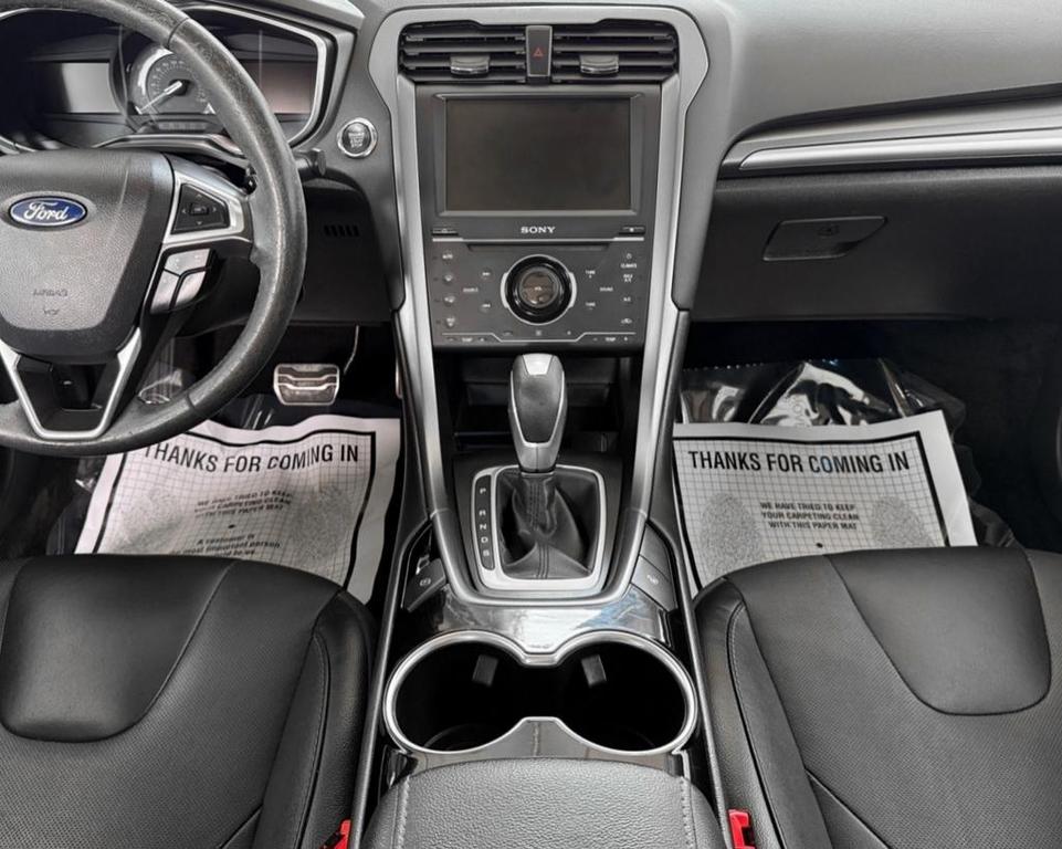 used 2015 Ford Fusion car, priced at $10,000