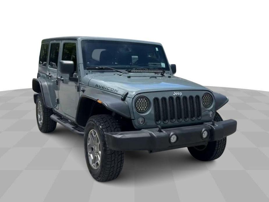 used 2014 Jeep Wrangler Unlimited car, priced at $23,599
