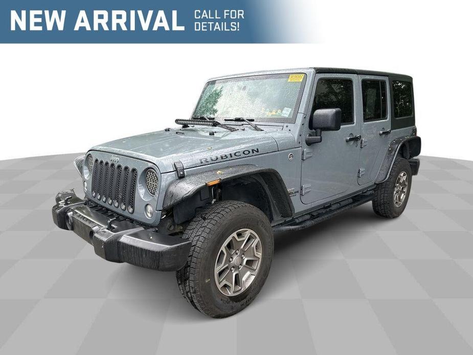 used 2014 Jeep Wrangler Unlimited car, priced at $23,911