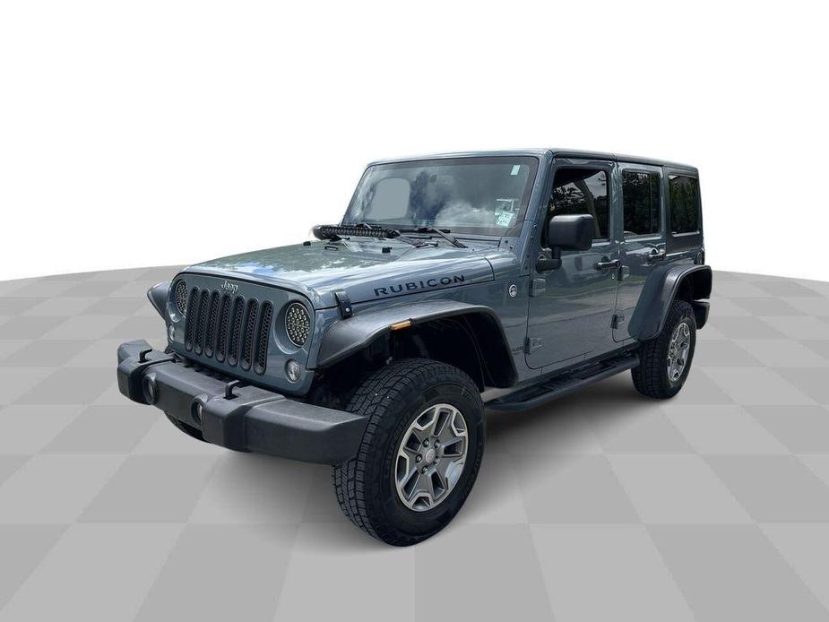 used 2014 Jeep Wrangler Unlimited car, priced at $23,599