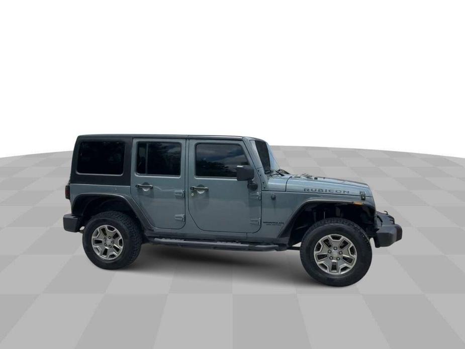 used 2014 Jeep Wrangler Unlimited car, priced at $23,847
