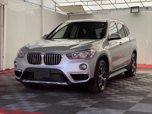 used 2018 BMW X1 car, priced at $12,990