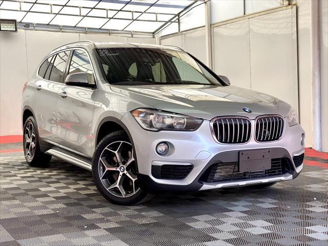 used 2018 BMW X1 car, priced at $12,990