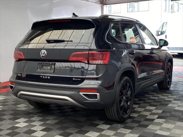 used 2023 Volkswagen Taos car, priced at $22,999