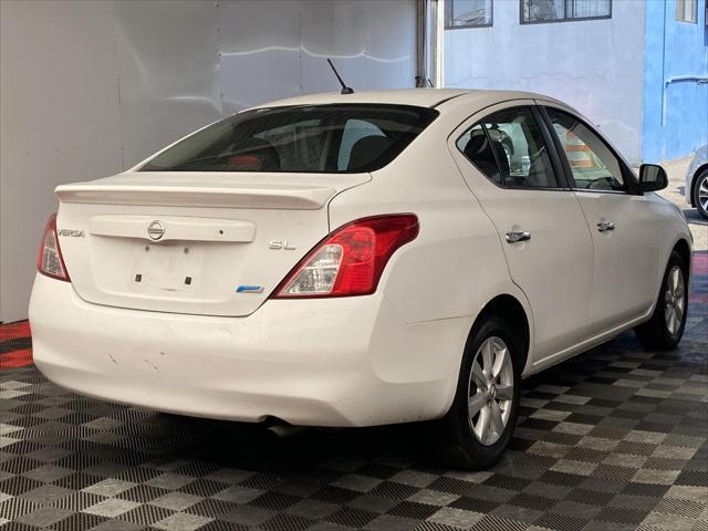 used 2012 Nissan Versa car, priced at $5,995