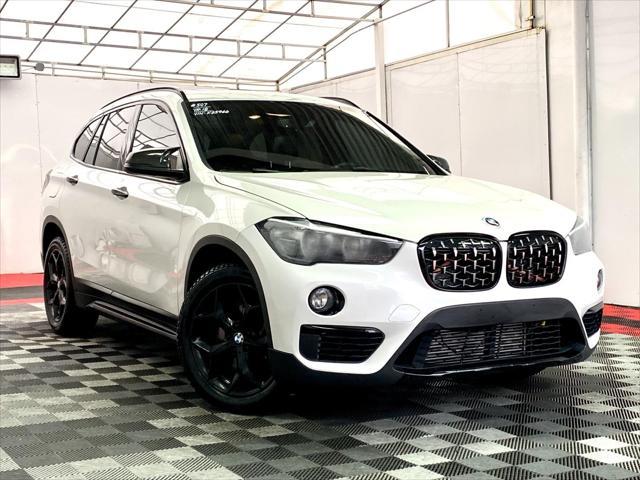 used 2018 BMW X1 car, priced at $13,980