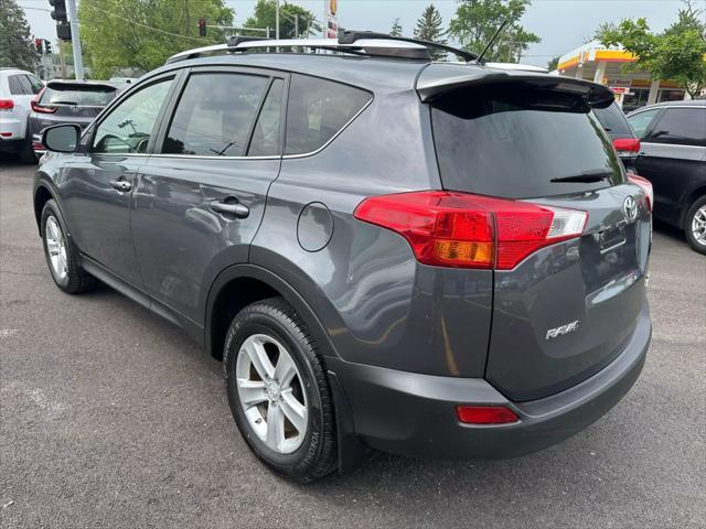 used 2013 Toyota RAV4 car, priced at $13,500