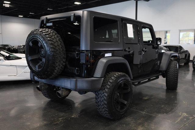 used 2016 Jeep Wrangler Unlimited car, priced at $30,990
