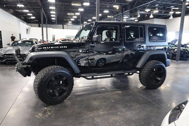 used 2016 Jeep Wrangler Unlimited car, priced at $30,990
