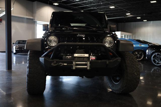 used 2013 Jeep Wrangler Unlimited car, priced at $21,900