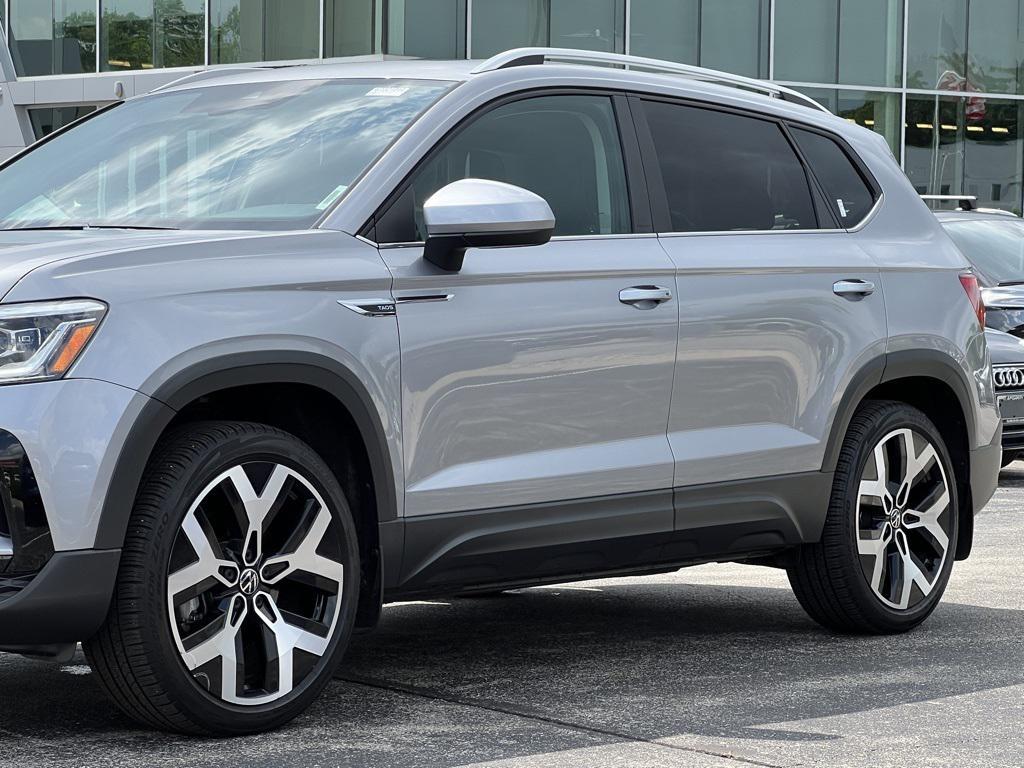 used 2023 Volkswagen Taos car, priced at $24,000