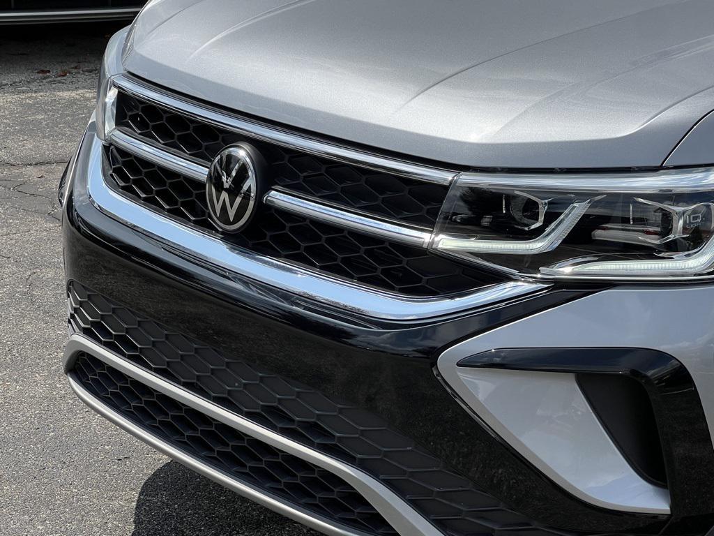 used 2023 Volkswagen Taos car, priced at $24,000