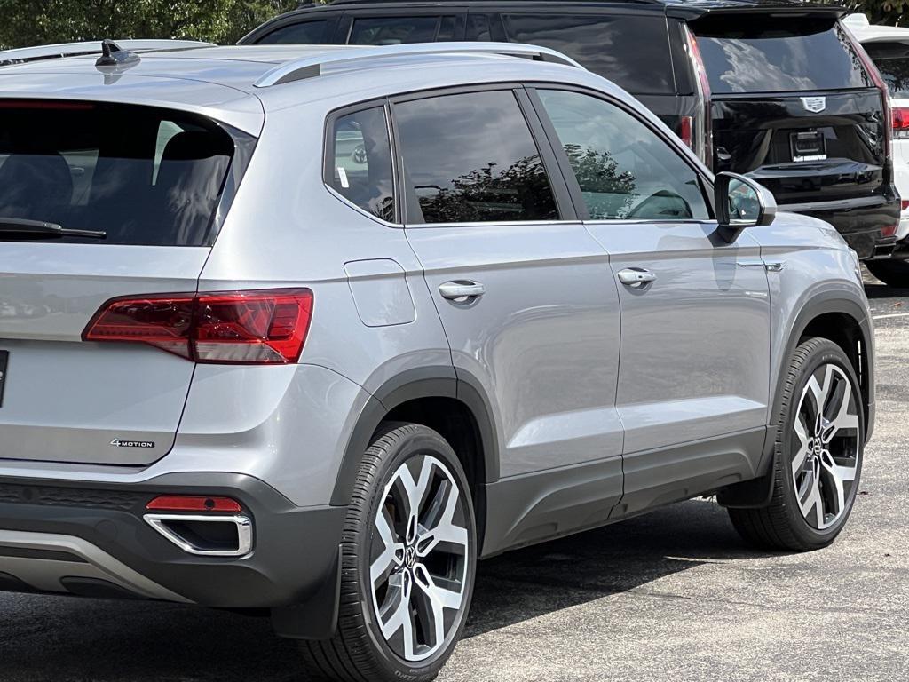 used 2023 Volkswagen Taos car, priced at $24,000