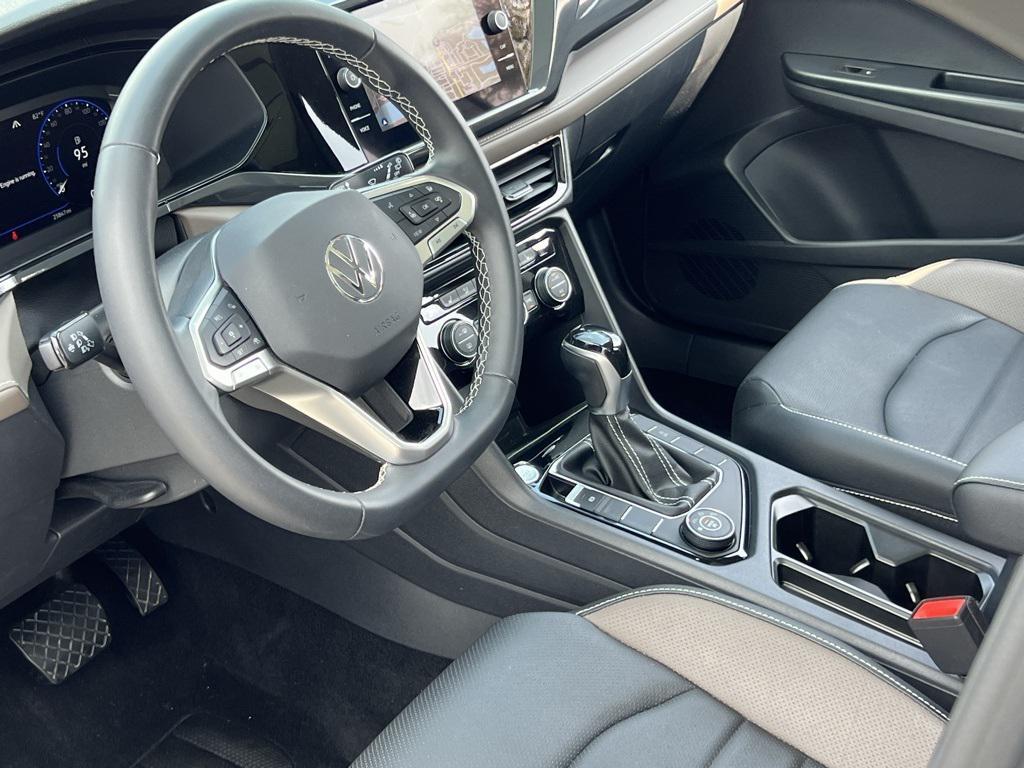 used 2023 Volkswagen Taos car, priced at $24,000