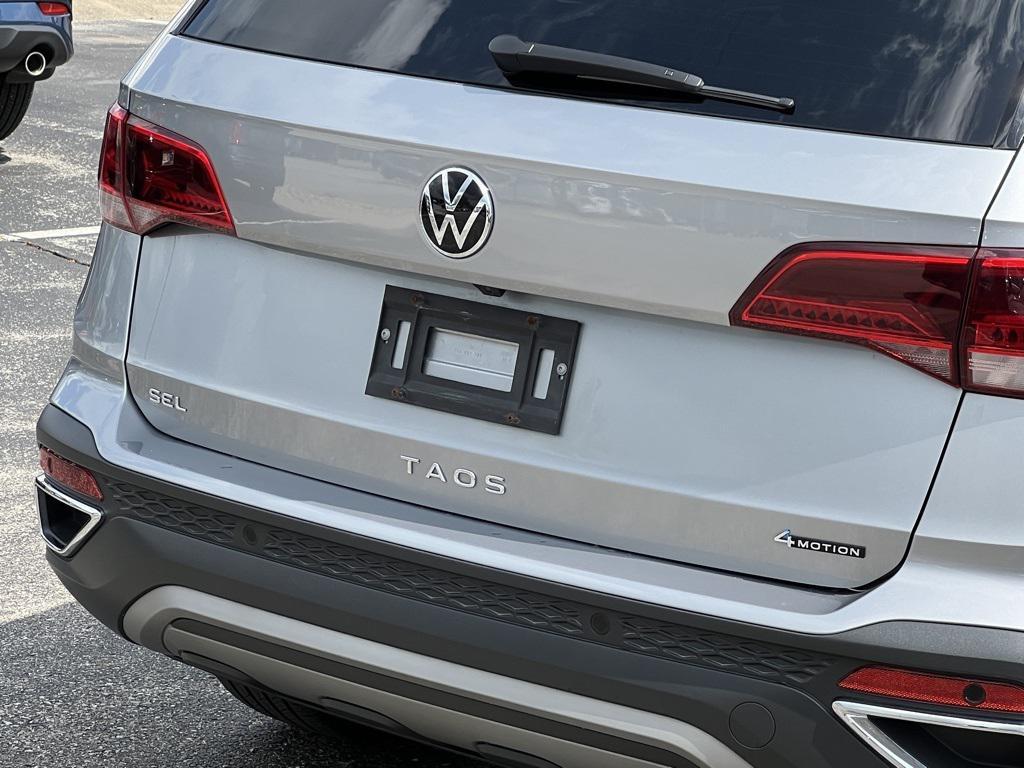 used 2023 Volkswagen Taos car, priced at $24,000
