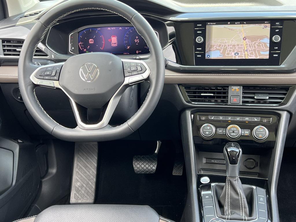 used 2023 Volkswagen Taos car, priced at $24,000