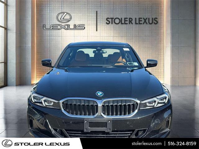 used 2023 BMW 330e car, priced at $36,200