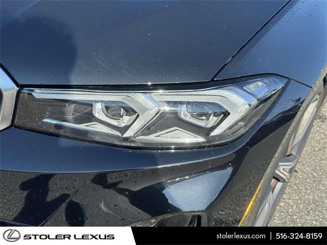 used 2023 BMW 330e car, priced at $36,200