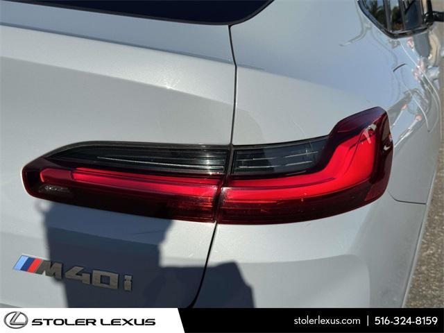 used 2023 BMW X4 car, priced at $50,000