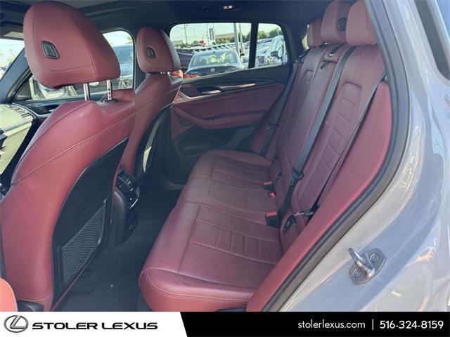 used 2023 BMW X4 car, priced at $50,000