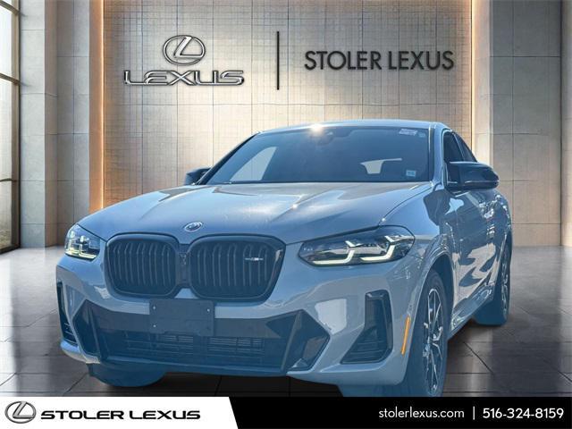 used 2023 BMW X4 car, priced at $50,000