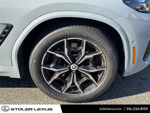 used 2023 BMW X4 car, priced at $50,000