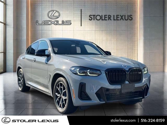 used 2023 BMW X4 car, priced at $50,000
