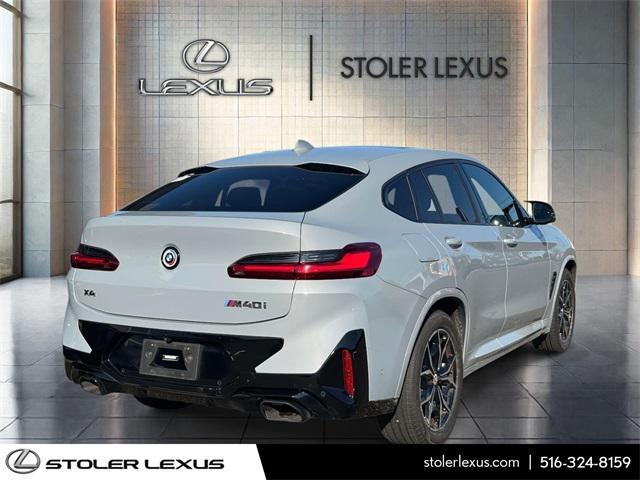 used 2023 BMW X4 car, priced at $50,000