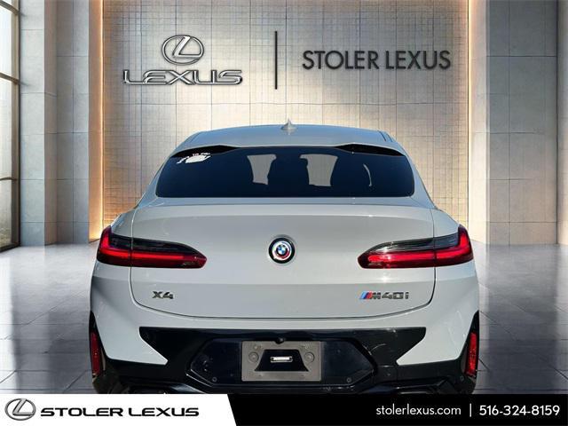 used 2023 BMW X4 car, priced at $50,000